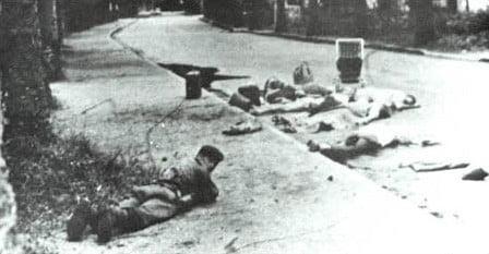The Belgian paracommando lying prone near Victoria Hotel in Congo during Operation Dragon Rouge